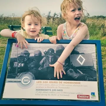 Children outside Arromanches 360 in Normandy